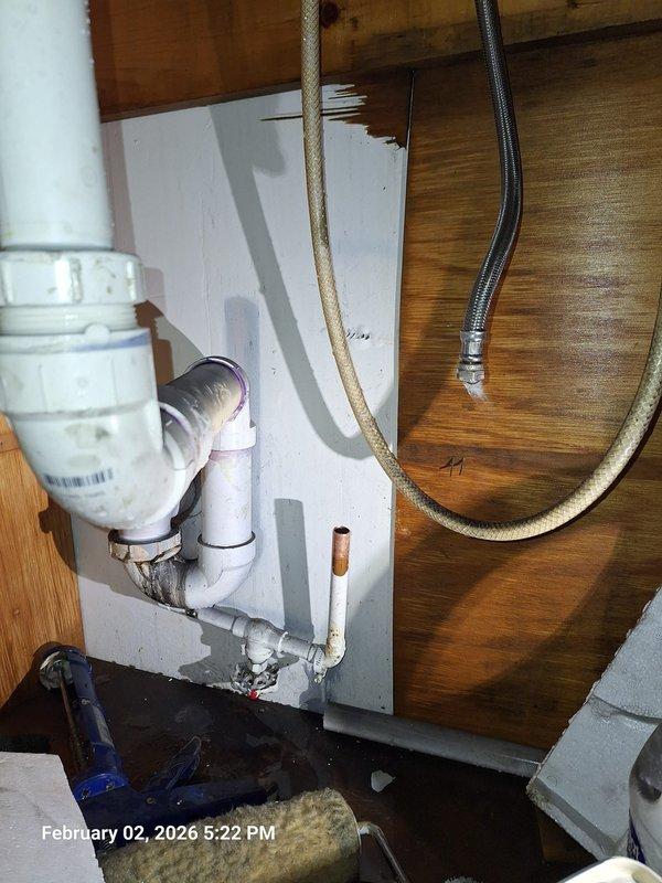 Identified and repaired a leak on a stop valve in a residential plumbing system. Replaced the faulty valve and verified proper operation of the water supply lines with no further leakage observed. Water staining on surrounding wooden surfaces was noted and customer was informed. Identified and repaired a leak on a stop valve in a residential plumbing system. Replaced the faulty valve and verified proper operation of the water supply lines with no further leakage observed. Water staining on surrounding wooden surfaces was noted and customer was informed.