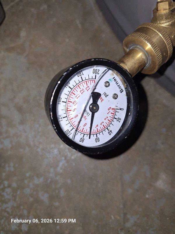 Performed gas line inspection for suspected leak at customer's fireplace. Conducted pressure testing using calibrated gauge, confirming system integrity at appropriate PSI. Inspected gas shut-off valve and associated piping, verifying proper installation of sediment trap and functional operation of the red lever handle valve. Performed gas line inspection for suspected leak at customer's fireplace. Conducted pressure testing using calibrated gauge, confirming system integrity at appropriate PSI. Inspected gas shut-off valve and associated piping, verifying proper installation of sediment trap and functional operation of the red lever handle valve.