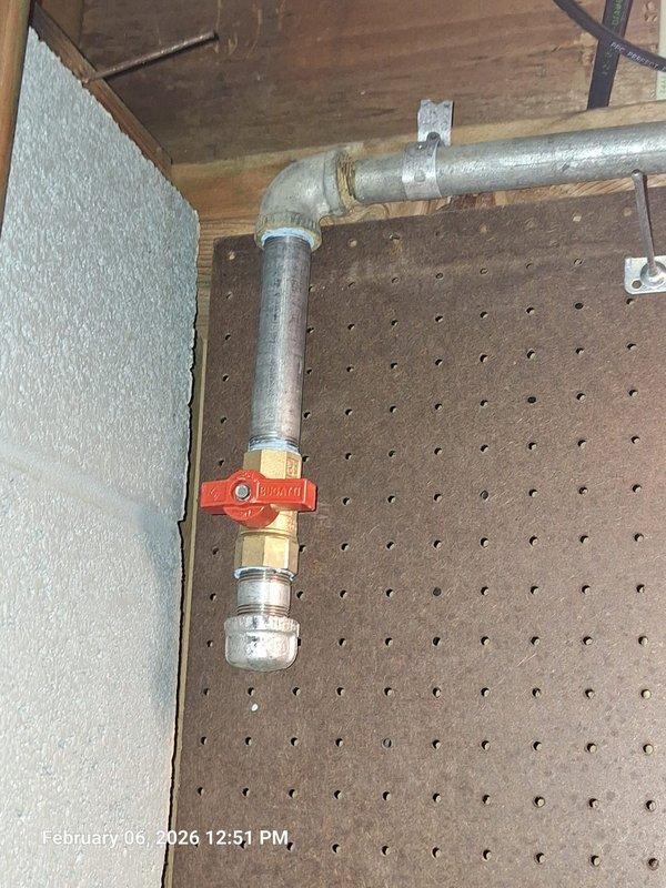 Performed gas line inspection for suspected leak at customer's fireplace. Conducted pressure testing using calibrated gauge, confirming system integrity at appropriate PSI. Inspected gas shut-off valve and associated piping, verifying proper installation of sediment trap and functional operation of the red lever handle valve. Performed gas line inspection for suspected leak at customer's fireplace. Conducted pressure testing using calibrated gauge, confirming system integrity at appropriate PSI. Inspected gas shut-off valve and associated piping, verifying proper installation of sediment trap and functional operation of the red lever handle valve.