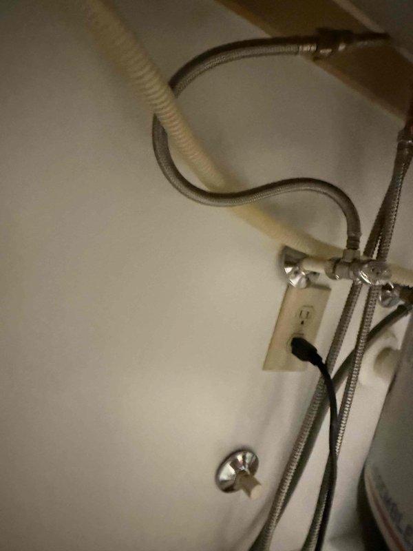 Diagnosed and repaired leak at the garbage disposal and dishwasher connection point. Inspected the water supply valve assembly and drain connections. Tightened loose fittings on the braided supply line and verified proper operation of both appliances with no further leakage. Diagnosed and repaired leak at the garbage disposal and dishwasher connection point. Inspected the water supply valve assembly and drain connections. Tightened loose fittings on the braided supply line and verified proper operation of both appliances with no further leakage.