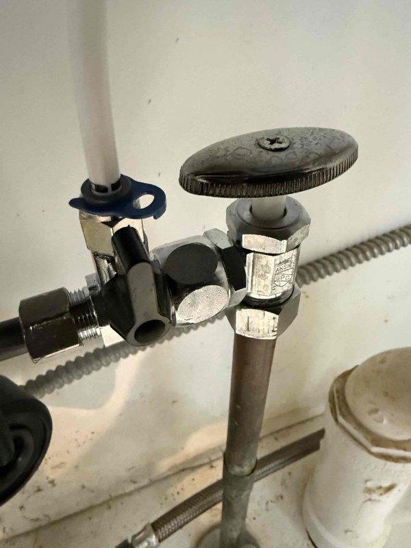 Connected kitchen sink cold water line to Brio Bottleless Countertop Water Cooler using appropriate compression fittings and T-junction valve assembly. Installed water supply line from existing plumbing to unit, verified proper operation with no leaks at connection points. Connected kitchen sink cold water line to Brio Bottleless Countertop Water Cooler using appropriate compression fittings and T-junction valve assembly. Installed water supply line from existing plumbing to unit, verified proper operation with no leaks at connection points.