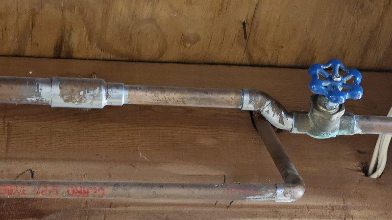 Conducted free estimate for gas line installation to accommodate new gas range, with furnace located in basement. Identified corroded shutoff valve for hose bibb requiring replacement, evidenced by significant green oxidation on brass valve body connected to PVC piping. Also evaluated existing kitchen faucet for replacement service. Conducted free estimate for gas line installation to accommodate new gas range, with furnace located in basement. Identified corroded shutoff valve for hose bibb requiring replacement, evidenced by significant green oxidation on brass valve body connected to PVC piping. Also evaluated existing kitchen faucet for replacement service.