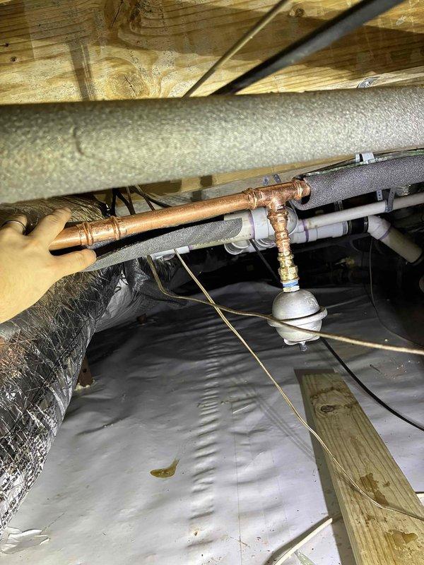 Inspected plumbing system in crawlspace area due to reported pressure issues. Examined copper pipe assembly with T-joints and ball valve that regulates water flow. Also inspected gas line system with brass fittings and valve/regulator to determine if related to pressure complaints. Inspected plumbing system in crawlspace area due to reported pressure issues. Examined copper pipe assembly with T-joints and ball valve that regulates water flow. Also inspected gas line system with brass fittings and valve/regulator to determine if related to pressure complaints.