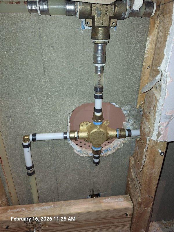 Successfully completed shower valve replacement as quoted. Removed existing deteriorated mixing valve from tiled wall access point and installed new brass mixing valve with proper PEX connections and waterproofing membrane around the opening. Successfully completed shower valve replacement as quoted. Removed existing deteriorated mixing valve from tiled wall access point and installed new brass mixing valve with proper PEX connections and waterproofing membrane around the opening.