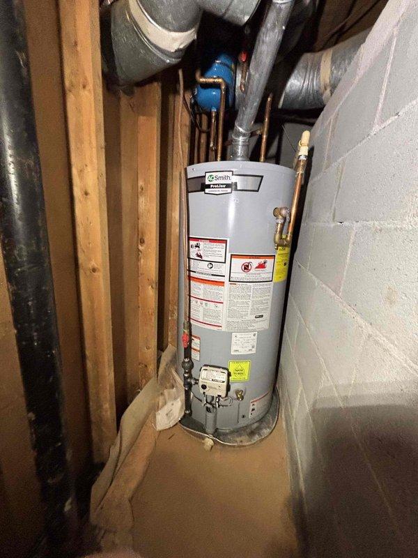 Responded to service call for leaking sink with drainage issues. Inspected double-basin kitchen sink where garbage disposal side was leaking and second basin wasn't draining properly. Customer also reported water in unfinished basement, but source couldn't be definitively determined as it may be weather-related with no visible ceiling damage in the affected area. Responded to service call for leaking sink with drainage issues. Inspected double-basin kitchen sink where garbage disposal side was leaking and second basin wasn't draining properly. Customer also reported water in unfinished basement, but source couldn't be definitively determined as it may be weather-related with no visible ceiling damage in the affected area.