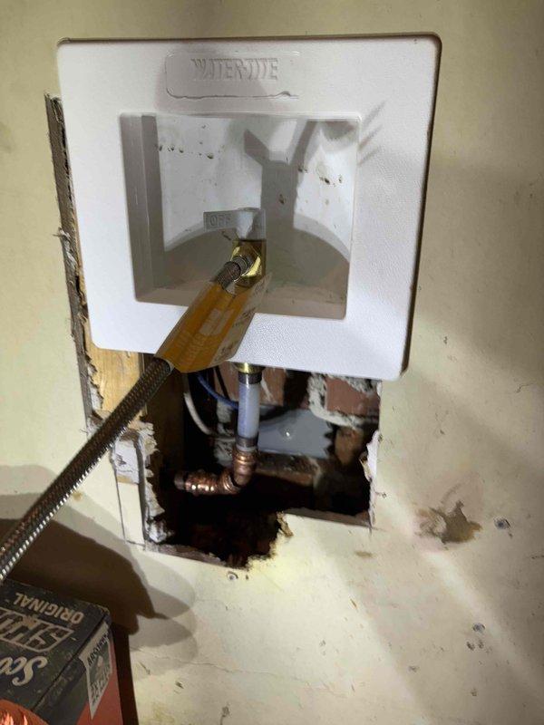 Responded to service call for plumbing repair where customer had purchased a SharkBite valve box to replace an old refrigerator water supply. Upon inspection, found existing Watermite box installation with copper pipe fittings and yellow-handled shutoff valve that required removal. Completed installation of customer-supplied SharkBite valve box, ensuring proper connections to existing plumbing and verifying operation before completion. Responded to service call for plumbing repair where customer had purchased a SharkBite valve box to replace an old refrigerator water supply. Upon inspection, found existing Watermite box installation with copper pipe fittings and yellow-handled shutoff valve that required removal. Completed installation of customer-supplied SharkBite valve box, ensuring proper connections to existing plumbing and verifying operation before completion.