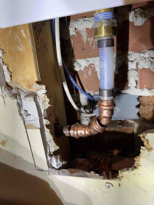 Responded to service call for plumbing repair where customer had purchased a SharkBite valve box to replace an old refrigerator water supply. Upon inspection, found existing Watermite box installation with copper pipe fittings and yellow-handled shutoff valve that required removal. Completed installation of customer-supplied SharkBite valve box, ensuring proper connections to existing plumbing and verifying operation before completion. Responded to service call for plumbing repair where customer had purchased a SharkBite valve box to replace an old refrigerator water supply. Upon inspection, found existing Watermite box installation with copper pipe fittings and yellow-handled shutoff valve that required removal. Completed installation of customer-supplied SharkBite valve box, ensuring proper connections to existing plumbing and verifying operation before completion.