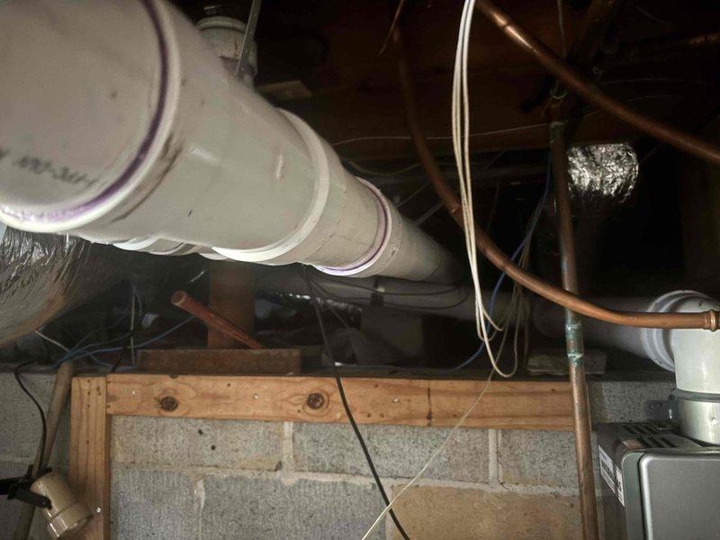 Completed cast iron pipe repair in basement utility area. Installed new PVC drainage system with proper connections to existing copper supply lines. All work performed according to code with successful pressure testing. Completed cast iron pipe repair in basement utility area. Installed new PVC drainage system with proper connections to existing copper supply lines. All work performed according to code with successful pressure testing.