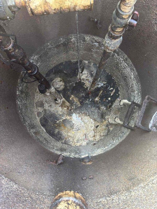 Performed quarterly jetting service on lift station to remove significant sediment buildup and debris from concrete basin. Cleaned corroded pipes and plumbing components showing substantial rust and mineral deposits. System was successfully restored to proper operation; recommended continuing quarterly jetting maintenance to prevent future accumulation. Performed quarterly jetting service on lift station to remove significant sediment buildup and debris from concrete basin. Cleaned corroded pipes and plumbing components showing substantial rust and mineral deposits. System was successfully restored to proper operation; recommended continuing quarterly jetting maintenance to prevent future accumulation.