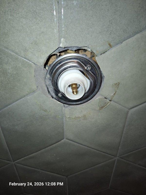 Completed scheduled follow-up to previous diagnostic work on Kohler shower multi-valve. Removed damaged valve assembly from tiled wall, which showed significant water damage and deterioration around the fixture. Installed replacement Kohler valve unit, securing all connections and verifying proper operation with no leaks. Completed scheduled follow-up to previous diagnostic work on Kohler shower multi-valve. Removed damaged valve assembly from tiled wall, which showed significant water damage and deterioration around the fixture. Installed replacement Kohler valve unit, securing all connections and verifying proper operation with no leaks.