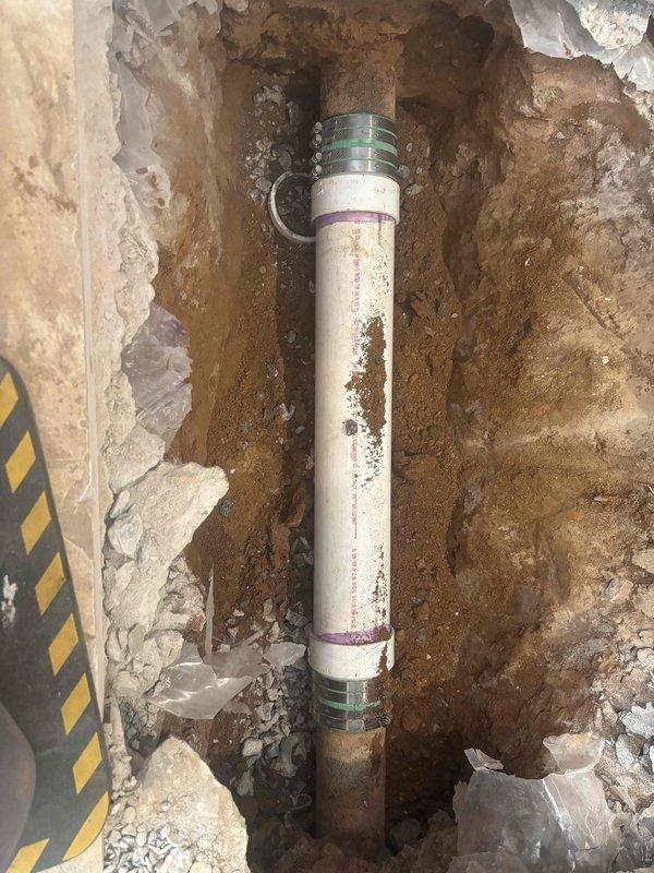 Completed drain repair service requiring excavation to access damaged PVC drainage pipe. Installed new pipe section with appropriate couplings and performed pressure testing to verify integrity. Additionally installed pressure reducing valve (PRV) as requested, and restored flooring by removing damaged tile to access underlying plumbing infrastructure. Completed drain repair service requiring excavation to access damaged PVC drainage pipe. Installed new pipe section with appropriate couplings and performed pressure testing to verify integrity. Additionally installed pressure reducing valve (PRV) as requested, and restored flooring by removing damaged tile to access underlying plumbing infrastructure.