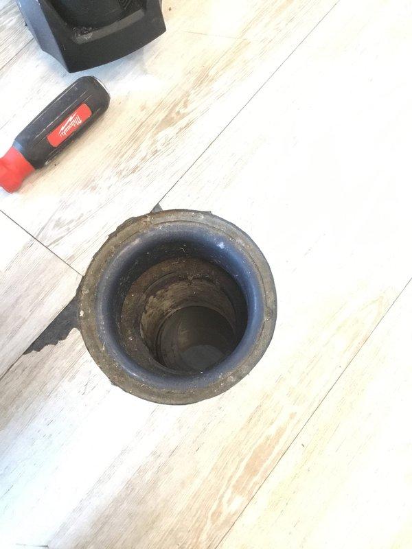 Chamblee, GA - Responded to report of toilet leakage extending beyond bathroom area. Upon inspection, identified corroded drain pipe with significant wear around edges and visible residue accumulation. Accessed floor opening to address the leak source and performed necessary repairs to prevent further water damage. Chamblee, GA - Responded to report of toilet leakage extending beyond bathroom area. Upon inspection, identified corroded drain pipe with significant wear around edges and visible residue accumulation. Accessed floor opening to address the leak source and performed necessary repairs to prevent further water damage.