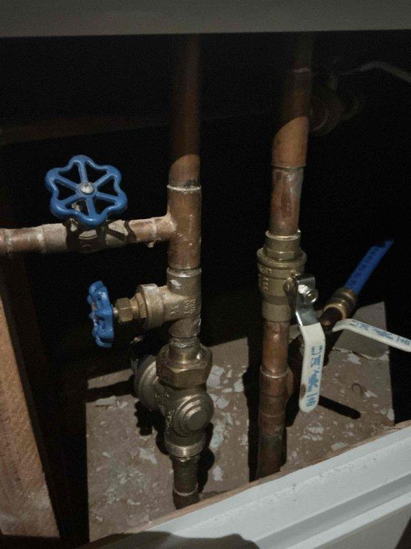 Conducted on-site assessment of existing Whirlpool water heater for potential replacement. Inspected current installation including copper supply lines, gas connection, flue venting, and expansion tank. Photos documented the plumbing infrastructure and current unit configuration to prepare comprehensive replacement estimate. Conducted on-site assessment of existing Whirlpool water heater for potential replacement. Inspected current installation including copper supply lines, gas connection, flue venting, and expansion tank. Photos documented the plumbing infrastructure and current unit configuration to prepare comprehensive replacement estimate.