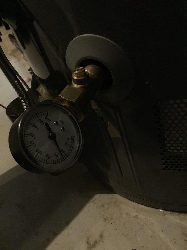 Diagnosed and repaired toilet leak by testing water pressure (reading approximately 100-120 PSI) and replacing damaged braided stainless steel supply line. Confirmed proper connection at shut-off valve and verified no further leakage after repair. Diagnosed and repaired toilet leak by testing water pressure (reading approximately 100-120 PSI) and replacing damaged braided stainless steel supply line. Confirmed proper connection at shut-off valve and verified no further leakage after repair.