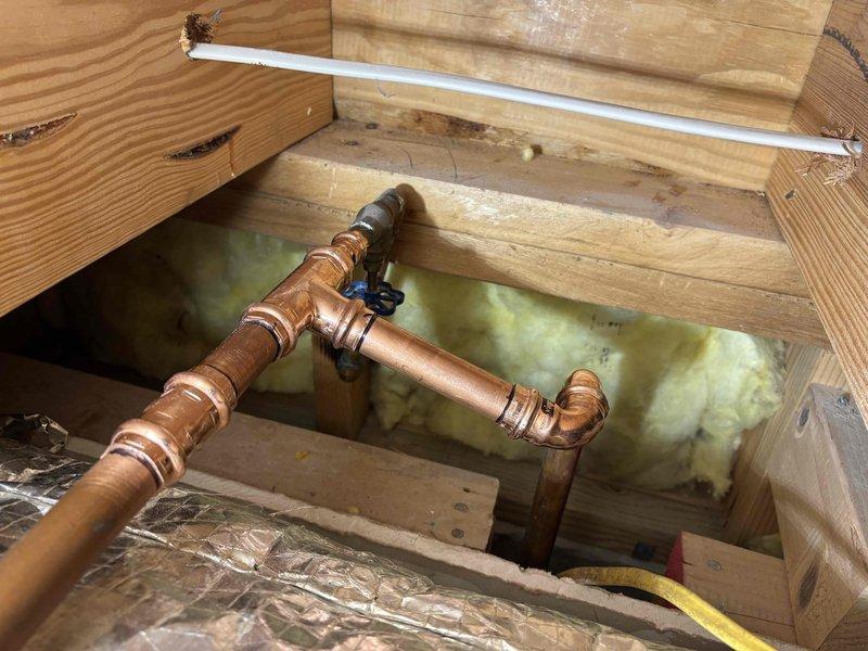 Responded to service call for a leak at the main shut-off valve when in closed position. Replaced water supply line and documented the condition of the valve assembly with photos showing the copper pipe configuration in the access panel. Customer was informed that replacement would be warranty-covered if valve was previously installed by our company, otherwise standard charges would apply for original valve replacement. Responded to service call for a leak at the main shut-off valve when in closed position. Replaced water supply line and documented the condition of the valve assembly with photos showing the copper pipe configuration in the access panel. Customer was informed that replacement would be warranty-covered if valve was previously installed by our company, otherwise standard charges would apply for original valve replacement.