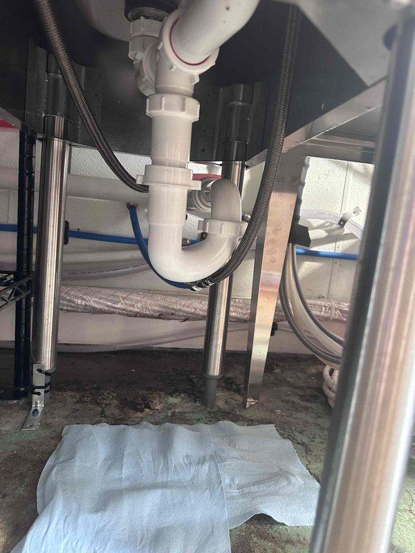 Diagnosed and repaired a leaking drain pipe at customer's bar installation. Upon inspection, found improper sealing at pipe connection points in the P-trap assembly. Disassembled affected plumbing components, cleaned connection surfaces, and reassembled with proper sealing techniques to ensure watertight connections. Diagnosed and repaired a leaking drain pipe at customer's bar installation. Upon inspection, found improper sealing at pipe connection points in the P-trap assembly. Disassembled affected plumbing components, cleaned connection surfaces, and reassembled with proper sealing techniques to ensure watertight connections.