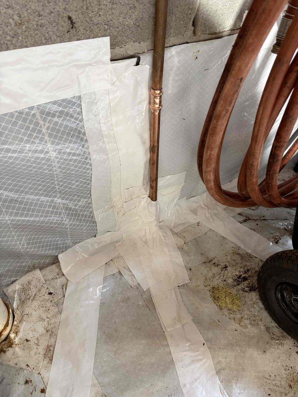 Located and repaired a leak in the water main line at the base of the house foundation where it enters the crawl space. Discovered significant corrosion at the junction where a rusty metal pipe connected to a PVC section, which was the source of the leak. Replaced the damaged section with new copper piping and fittings to ensure proper sealing and prevent future leakage issues. Located and repaired a leak in the water main line at the base of the house foundation where it enters the crawl space. Discovered significant corrosion at the junction where a rusty metal pipe connected to a PVC section, which was the source of the leak. Replaced the damaged section with new copper piping and fittings to ensure proper sealing and prevent future leakage issues.