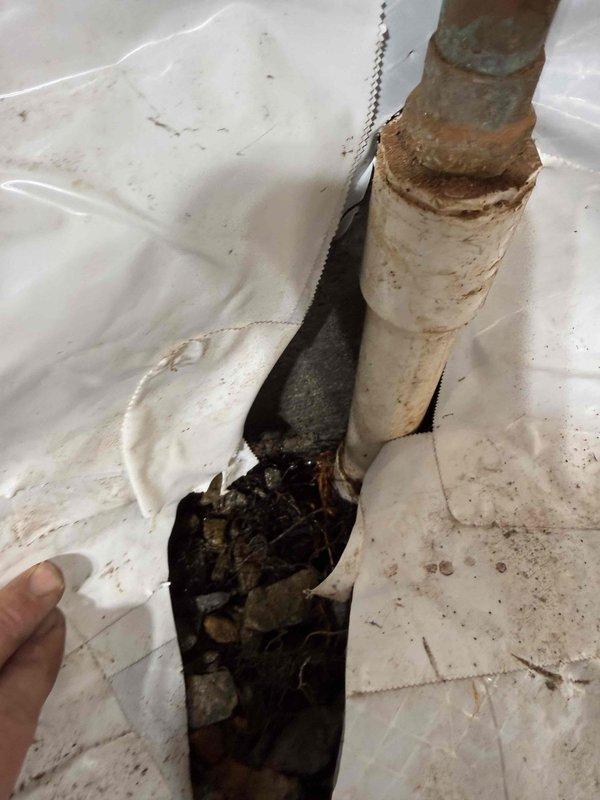 Located and repaired a leak in the water main line at the base of the house foundation where it enters the crawl space. Discovered significant corrosion at the junction where a rusty metal pipe connected to a PVC section, which was the source of the leak. Replaced the damaged section with new copper piping and fittings to ensure proper sealing and prevent future leakage issues. Located and repaired a leak in the water main line at the base of the house foundation where it enters the crawl space. Discovered significant corrosion at the junction where a rusty metal pipe connected to a PVC section, which was the source of the leak. Replaced the damaged section with new copper piping and fittings to ensure proper sealing and prevent future leakage issues.