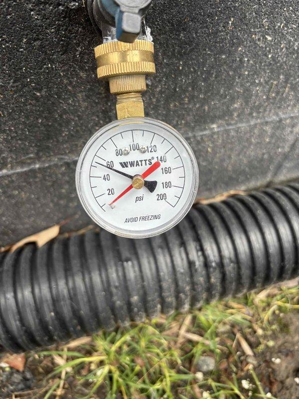 Upon arrival, found sump pump non-operational with significant debris contamination in the pump basin. Discovered damaged mechanical components including a compromised spring assembly and torn rubber gaskets submerged in muddy water. Tested system pressure with gauge, confirming inadequate pressure (approximately 20 psi) at discharge line, indicating pump failure. Upon arrival, found sump pump non-operational with significant debris contamination in the pump basin. Discovered damaged mechanical components including a compromised spring assembly and torn rubber gaskets submerged in muddy water. Tested system pressure with gauge, confirming inadequate pressure (approximately 20 psi) at discharge line, indicating pump failure.