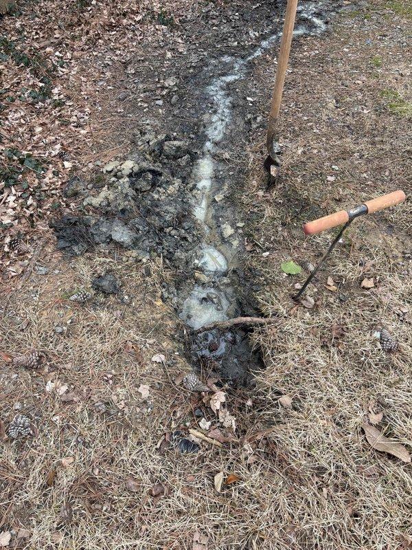 Responded to service call for toilet leaking into garage below. Excavated drainage channel to divert water away from structure and prevent future leakage. Confirmed successful resolution of the leak as reported by customer. Responded to service call for toilet leaking into garage below. Excavated drainage channel to divert water away from structure and prevent future leakage. Confirmed successful resolution of the leak as reported by customer.