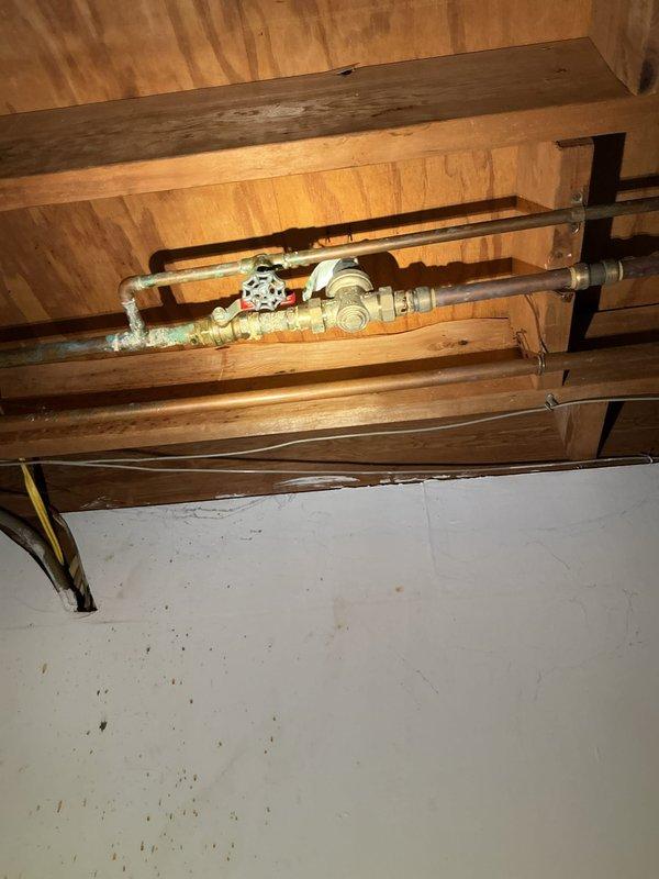 Responded to service call for clogged kitchen drain. Inspected existing plumbing system including copper supply lines and shutoff valve assembly mounted between floor joists. Utilized mini jetter to clear obstruction, restoring normal drainage function. System pressure tested at approximately 130 PSI post-service, confirming proper operation. Responded to service call for clogged kitchen drain. Inspected existing plumbing system including copper supply lines and shutoff valve assembly mounted between floor joists. Utilized mini jetter to clear obstruction, restoring normal drainage function. System pressure tested at approximately 130 PSI post-service, confirming proper operation.