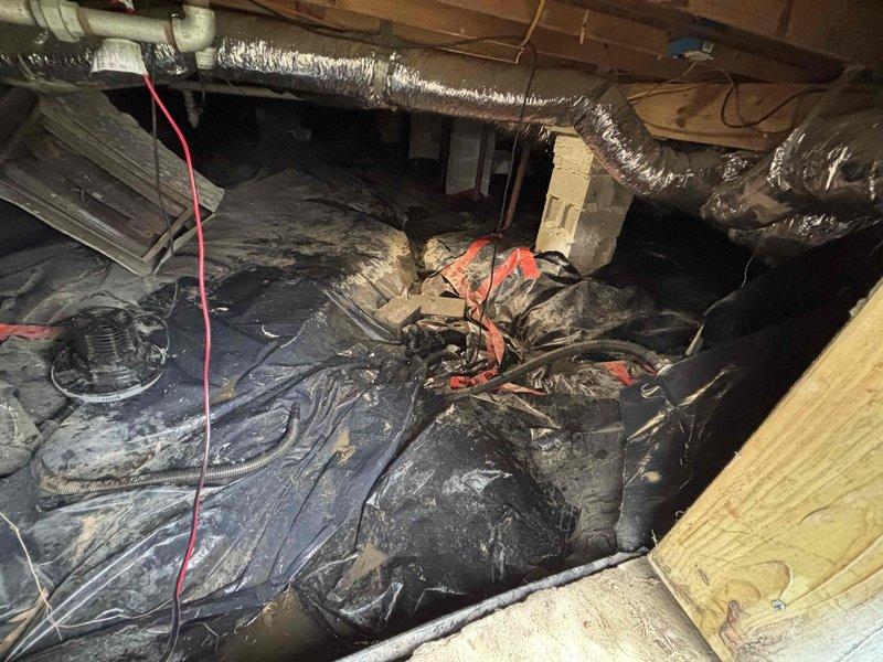 Replaced faulty sump pump and installed new PVC drain pipe in crawlspace. Properly secured connections with purple primer/cement at joints. Vapor barrier was adjusted as needed to accommodate the new plumbing components. Replaced faulty sump pump and installed new PVC drain pipe in crawlspace. Properly secured connections with purple primer/cement at joints. Vapor barrier was adjusted as needed to accommodate the new plumbing components.