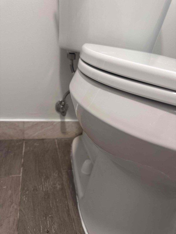 Inspected toilet reported for leaking issue. Identified water supply line connection at wall junction as source of the leak. Replaced faulty supply line and verified proper seal, eliminating the leak. All connections tested and confirmed watertight. Inspected toilet reported for leaking issue. Identified water supply line connection at wall junction as source of the leak. Replaced faulty supply line and verified proper seal, eliminating the leak. All connections tested and confirmed watertight.