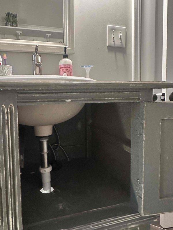 Responded to service call for slow drains and sewage odor in crawlspace. Inspected bathroom plumbing system including P-trap configuration and associated PVC drain pipes. Identified and cleared blockage in drain line that was causing backup and sewer gas intrusion, restoring proper drainage function and eliminating odor issue. Responded to service call for slow drains and sewage odor in crawlspace. Inspected bathroom plumbing system including P-trap configuration and associated PVC drain pipes. Identified and cleared blockage in drain line that was causing backup and sewer gas intrusion, restoring proper drainage function and eliminating odor issue.