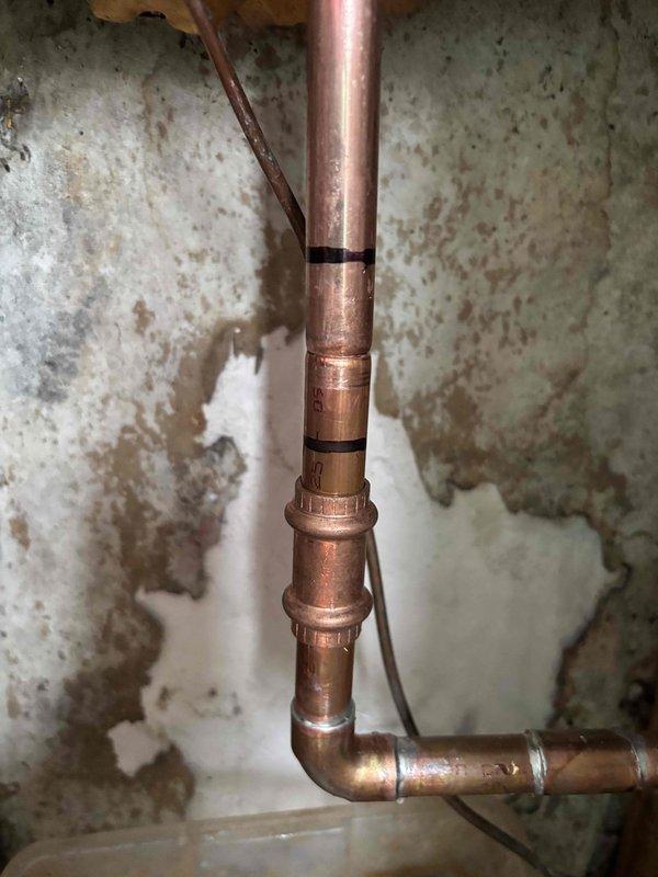 Diagnosed and replaced leaking hose bib TP. Copper supply plumbing appeared functional with signs of previous water damage on surrounding wall. Pressure gauge reading confirmed system now operating at approximately 20-30 PSI within normal parameters. Diagnosed and replaced leaking hose bib TP. Copper supply plumbing appeared functional with signs of previous water damage on surrounding wall. Pressure gauge reading confirmed system now operating at approximately 20-30 PSI within normal parameters.