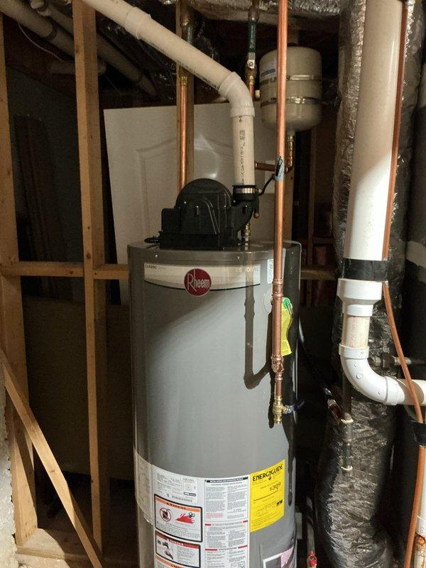 Installed new Rheem power vent water heater in utility area, including proper connection of copper supply lines, PVC venting, and expansion tank mounting. Inspected kitchen faucet as requested and documented proper plumbing infrastructure with exposed framing and insulation prior to wall enclosure. Installed new Rheem power vent water heater in utility area, including proper connection of copper supply lines, PVC venting, and expansion tank mounting. Inspected kitchen faucet as requested and documented proper plumbing infrastructure with exposed framing and insulation prior to wall enclosure.