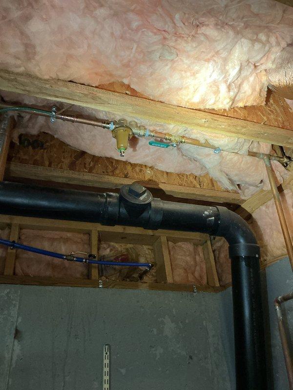 Installed new Rheem power vent water heater in utility area, including proper connection of copper supply lines, PVC venting, and expansion tank mounting. Inspected kitchen faucet as requested and documented proper plumbing infrastructure with exposed framing and insulation prior to wall enclosure. Installed new Rheem power vent water heater in utility area, including proper connection of copper supply lines, PVC venting, and expansion tank mounting. Inspected kitchen faucet as requested and documented proper plumbing infrastructure with exposed framing and insulation prior to wall enclosure.