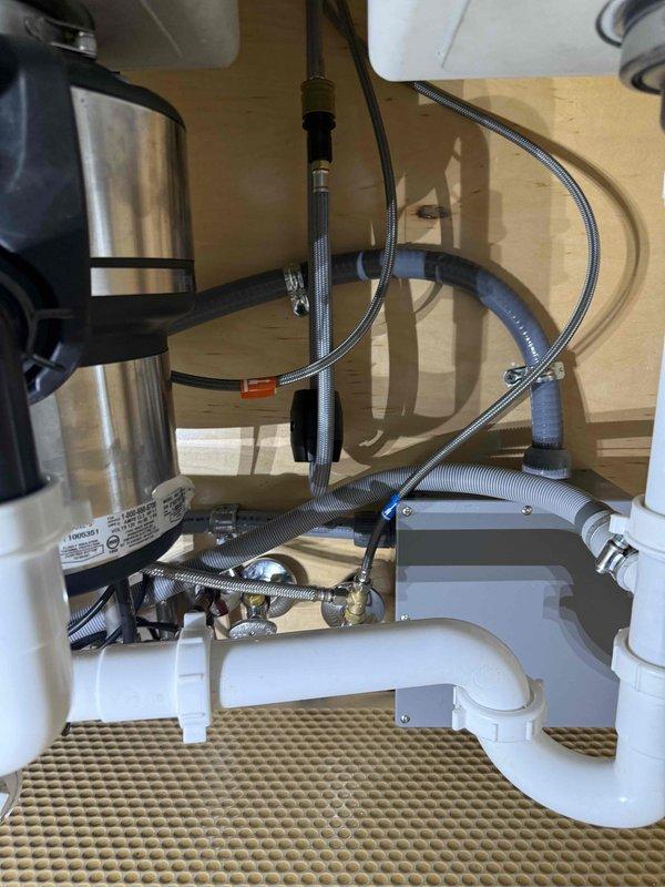 Cleared kitchen sink clog and successfully installed customer-supplied under-sink instantaneous micro water heater from Chronomite Laboratories. Properly connected water lines with appropriate braided supply lines and ensured electrical connection was secure and compliant with code requirements. Cleared kitchen sink clog and successfully installed customer-supplied under-sink instantaneous micro water heater from Chronomite Laboratories. Properly connected water lines with appropriate braided supply lines and ensured electrical connection was secure and compliant with code requirements.