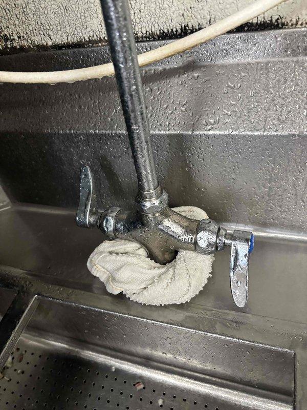 Responded to service call for kitchen floor drain clog. Removed damaged drain cap that had previously been installed. Successfully snaked drain line to clear blockage and restore proper drainage function. Responded to service call for kitchen floor drain clog. Removed damaged drain cap that had previously been installed. Successfully snaked drain line to clear blockage and restore proper drainage function.