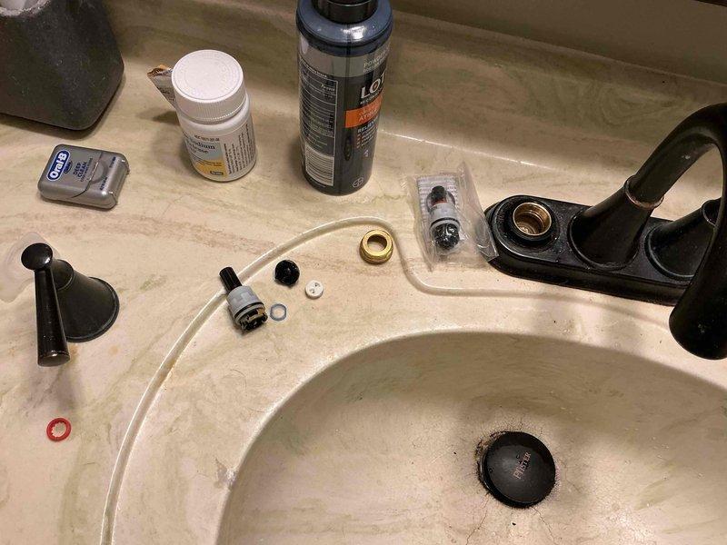 # Service Report
## Job Description
Responded to service call for no hot water at kitchen sink and spare bathroom located directly above kitchen area. Issue occurred after customer's dishwasher replacement. Upon investigation, determined that hot water supply lines had been improperly reconnected or shut off during dishwasher installation work.
Accessed spare bathroom faucet assembly and disassembled two-handle fixture to diagnose water flow issue. Identified problem with hot water supply valve or cartridge requiring replacement. Removed old faucet cartridge and associated components including brass washers and O-rings. Installed new cartridge assembly with replacement seals to restore proper hot water flow to bathroom fixture.
Verified hot water supply lines were properly connected and valves fully opened at both kitchen and bathroom locations. Tested water temperature and flow at both fixtures to confirm hot water restoration. Reassembled bathroom faucet hardware and verified no # Service Report
## Job Description
Responded to service call for no hot water at kitchen sink and spare bathroom located directly above kitchen area. Issue occurred after customer's dishwasher replacement. Upon investigation, determined that hot water supply lines had been improperly reconnected or shut off during dishwasher installation work.
Accessed spare bathroom faucet assembly and disassembled two-handle fixture to diagnose water flow issue. Identified problem with hot water supply valve or cartridge requiring replacement. Removed old faucet cartridge and associated components including brass washers and O-rings. Installed new cartridge assembly with replacement seals to restore proper hot water flow to bathroom fixture.
Verified hot water supply lines were properly connected and valves fully opened at both kitchen and bathroom locations. Tested water temperature and flow at both fixtures to confirm hot water restoration. Reassembled bathroom faucet hardware and verified no