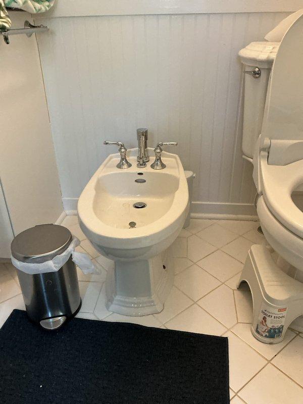 Responded to plumbing service call for malodorous sink and bidet installation. Diagnosed and addressed sink odor issue, likely caused by dry P-trap or drain buildup. Removed existing pedestal-style bidet fixture from bathroom, disconnecting water supply lines and drain connections. Installed customer-supplied bidet toilet seat attachment to existing toilet, connecting to water supply line and ensuring proper functionality of all controls and spray features. Verified all plumbing connections for leaks, tested bidet operation, and confirmed proper drainage. Left work area clean with all fixtures operational. Responded to plumbing service call for malodorous sink and bidet installation. Diagnosed and addressed sink odor issue, likely caused by dry P-trap or drain buildup. Removed existing pedestal-style bidet fixture from bathroom, disconnecting water supply lines and drain connections. Installed customer-supplied bidet toilet seat attachment to existing toilet, connecting to water supply line and ensuring proper functionality of all controls and spray features. Verified all plumbing connections for leaks, tested bidet operation, and confirmed proper drainage. Left work area clean with all fixtures operational.