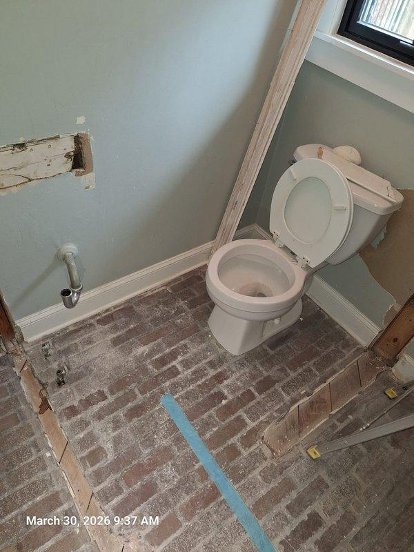 Conducted initial site assessment for gas line installation to new stove location. Documented existing conditions including floor layout with exposed brick flooring and wall penetrations where gas piping route will be determined. Assessed crawl space access and existing utility routing to plan gas line path from current termination point to proposed appliance location. Conducted initial site assessment for gas line installation to new stove location. Documented existing conditions including floor layout with exposed brick flooring and wall penetrations where gas piping route will be determined. Assessed crawl space access and existing utility routing to plan gas line path from current termination point to proposed appliance location.