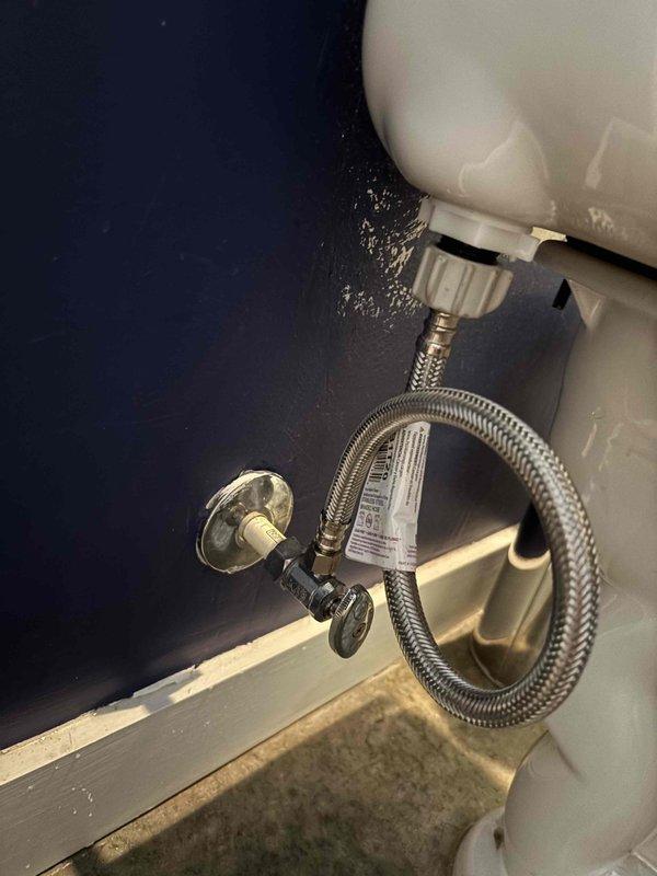 Responded to customer complaint of horn noise occurring when toilet was flushed. Inspected toilet fill valve, water supply line, and pressure regulator system. Documented existing plumbing configuration including braided flexible supply line connection, wall-mounted shut-off valve, and pressure gauge readings on water system. Verified proper installation of supply components and assessed system pressure levels to identify potential source of noise issue. Responded to customer complaint of horn noise occurring when toilet was flushed. Inspected toilet fill valve, water supply line, and pressure regulator system. Documented existing plumbing configuration including braided flexible supply line connection, wall-mounted shut-off valve, and pressure gauge readings on water system. Verified proper installation of supply components and assessed system pressure levels to identify potential source of noise issue.