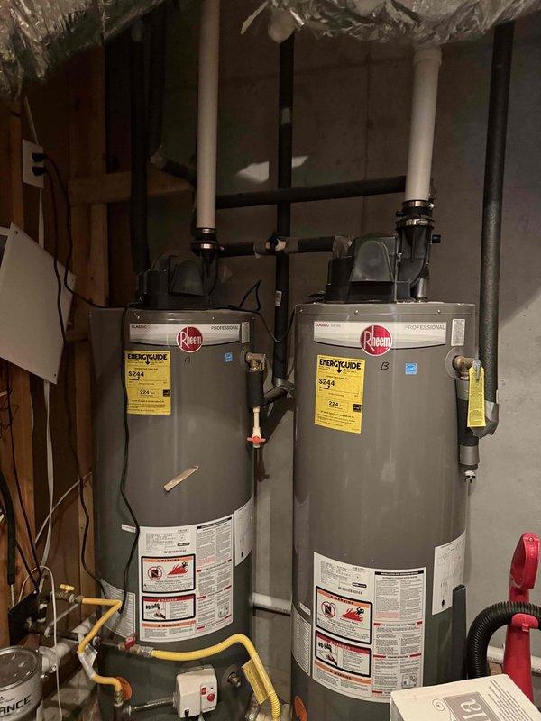 Responded to emergency call for water heater flooding in basement utility room. Upon arrival, assessed two Rheem water heaters and identified source of leak causing water damage to basement floor. Performed necessary repairs to stop active flooding, inspected all plumbing connections including gas lines, water supply lines, and drain assemblies for additional leaks or potential failure points. Verified proper operation of both units and ensured all connections were secure to prevent future water intrusion. Responded to emergency call for water heater flooding in basement utility room. Upon arrival, assessed two Rheem water heaters and identified source of leak causing water damage to basement floor. Performed necessary repairs to stop active flooding, inspected all plumbing connections including gas lines, water supply lines, and drain assemblies for additional leaks or potential failure points. Verified proper operation of both units and ensured all connections were secure to prevent future water intrusion.