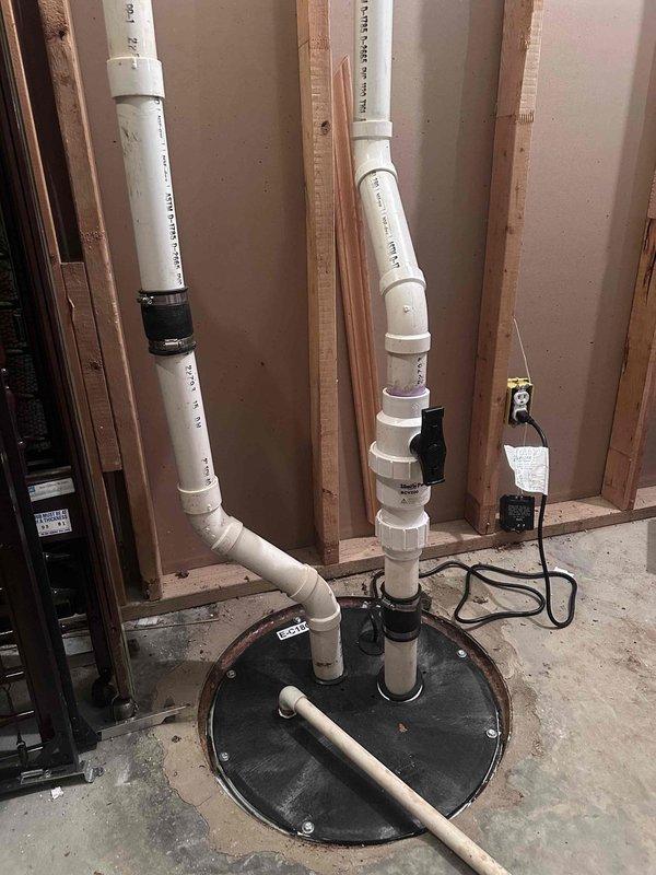 Installed sewage ejection pump system in basement with new basin, discharge piping, and electrical connections. Configured PVC discharge lines with proper venting and secured all piping to wall framing per code requirements. Installed sewage ejection pump system in basement with new basin, discharge piping, and electrical connections. Configured PVC discharge lines with proper venting and secured all piping to wall framing per code requirements.
