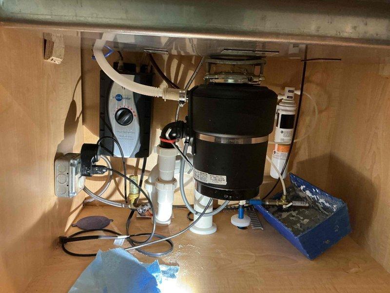 Installed customer-supplied kitchen faucet, connecting supply lines and drain assembly to existing plumbing infrastructure beneath sink. Verified proper operation of garbage disposal unit and associated drainage system, ensuring all connections were secure and leak-free upon completion. Installed customer-supplied kitchen faucet, connecting supply lines and drain assembly to existing plumbing infrastructure beneath sink. Verified proper operation of garbage disposal unit and associated drainage system, ensuring all connections were secure and leak-free upon completion.