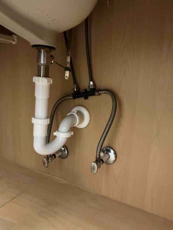 Completed tankless water heater upgrade installation, replacing existing conventional water heating system. Installed new wall-mounted tankless unit with proper venting, gas connections, and integrated plumbing network including PEX supply lines, copper piping, shut-off valves with isolation capability, and pressure relief components. All connections secured to structural framing per code requirements, system tested and verified operational. Completed tankless water heater upgrade installation, replacing existing conventional water heating system. Installed new wall-mounted tankless unit with proper venting, gas connections, and integrated plumbing network including PEX supply lines, copper piping, shut-off valves with isolation capability, and pressure relief components. All connections secured to structural framing per code requirements, system tested and verified operational.