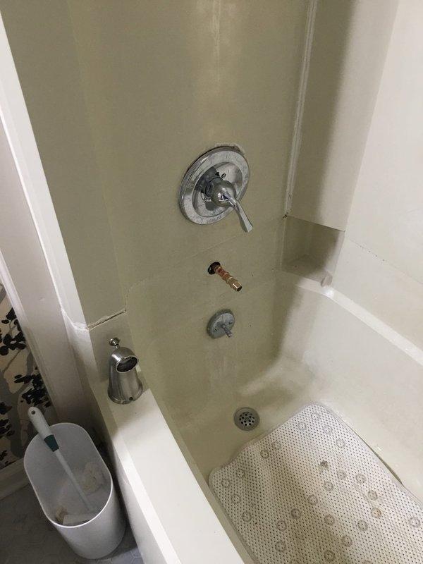 Responded to report of ceiling leak and conducted thorough inspection of affected areas. Documented extensive water damage to interior ceiling with compromised drywall, exposed structural framing, and material deterioration indicating active moisture intrusion. Traced leak source to bathroom directly above damaged ceiling area. Inspected shower and tub enclosure, identifying improper sealing around shower valve and tub spout penetrations as likely entry points for water migration. Photographed all damaged areas and plumbing fixtures for documentation purposes. Recommended immediate repairs to shower valve sealing, re-caulking of tub spout, and replacement of water-damaged ceiling drywall once source is properly remediated. Responded to report of ceiling leak and conducted thorough inspection of affected areas. Documented extensive water damage to interior ceiling with compromised drywall, exposed structural framing, and material deterioration indicating active moisture intrusion. Traced leak source to bathroom directly above damaged ceiling area. Inspected shower and tub enclosure, identifying improper sealing around shower valve and tub spout penetrations as likely entry points for water migration. Photographed all damaged areas and plumbing fixtures for documentation purposes. Recommended immediate repairs to shower valve sealing, re-caulking of tub spout, and replacement of water-damaged ceiling drywall once source is properly remediated.