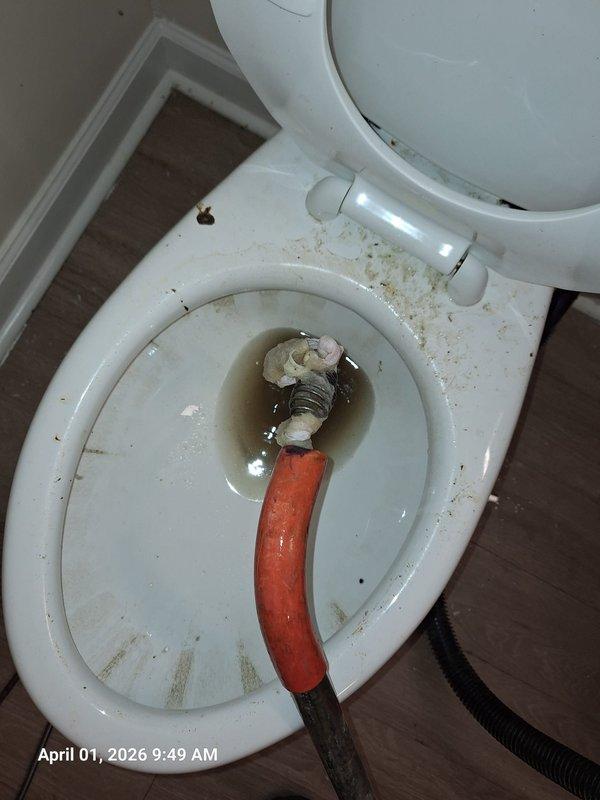 Responded to clogged toilet in unit 212 at senior living facility. Successfully cleared blockage using drum auger with flexible cable attachment, restoring proper drainage and flush function to the fixture. Responded to clogged toilet in unit 212 at senior living facility. Successfully cleared blockage using drum auger with flexible cable attachment, restoring proper drainage and flush function to the fixture.