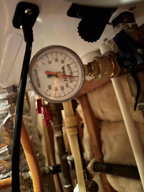 Responded to jetting service request at property where previous plumbing contractor had been on site. Performed hydro-jetting operations to clear drainage system obstruction. Inspected mechanical room plumbing components including pressure gauge assembly, brass fittings, copper piping, and pressure relief valve to ensure proper system function. Accessed attic crawl space to inspect pump installation and associated plumbing connections. Documented existing conditions of pressure monitoring equipment and mechanical systems with photographs for service records. Responded to jetting service request at property where previous plumbing contractor had been on site. Performed hydro-jetting operations to clear drainage system obstruction. Inspected mechanical room plumbing components including pressure gauge assembly, brass fittings, copper piping, and pressure relief valve to ensure proper system function. Accessed attic crawl space to inspect pump installation and associated plumbing connections. Documented existing conditions of pressure monitoring equipment and mechanical systems with photographs for service records.