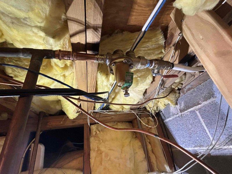 Responded to jetting service request at property where previous plumbing contractor had been on site. Performed hydro-jetting operations to clear drainage system obstruction. Inspected mechanical room plumbing components including pressure gauge assembly, brass fittings, copper piping, and pressure relief valve to ensure proper system function. Accessed attic crawl space to inspect pump installation and associated plumbing connections. Documented existing conditions of pressure monitoring equipment and mechanical systems with photographs for service records. Responded to jetting service request at property where previous plumbing contractor had been on site. Performed hydro-jetting operations to clear drainage system obstruction. Inspected mechanical room plumbing components including pressure gauge assembly, brass fittings, copper piping, and pressure relief valve to ensure proper system function. Accessed attic crawl space to inspect pump installation and associated plumbing connections. Documented existing conditions of pressure monitoring equipment and mechanical systems with photographs for service records.