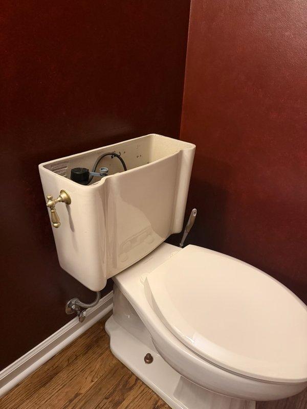 Responded to service call for toilet hissing noise and dripping exterior hose spigot. Inspected toilet tank and identified faulty fill valve assembly causing continuous water flow and audible hissing. Removed tank lid to assess internal components, noting discolored water and mineral buildup on flush valve and fill valve mechanisms. Replaced defective fill valve with new unit, adjusted water level, and tested flush cycle to ensure proper operation and eliminate noise. Proceeded to exterior hose spigot where customer reported persistent dripping. Disassembled spigot, replaced worn rubber gaskets and washers, reassembled unit, and verified leak was eliminated with full water pressure test. Responded to service call for toilet hissing noise and dripping exterior hose spigot. Inspected toilet tank and identified faulty fill valve assembly causing continuous water flow and audible hissing. Removed tank lid to assess internal components, noting discolored water and mineral buildup on flush valve and fill valve mechanisms. Replaced defective fill valve with new unit, adjusted water level, and tested flush cycle to ensure proper operation and eliminate noise. Proceeded to exterior hose spigot where customer reported persistent dripping. Disassembled spigot, replaced worn rubber gaskets and washers, reassembled unit, and verified leak was eliminated with full water pressure test.