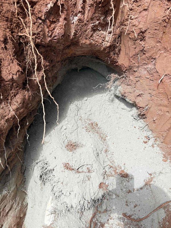 Completed sewer line repair requiring excavation to access and replace damaged underground piping. Excavated trench through clay-rich soil to expose compromised sewer line, removed failed section, and installed new PVC piping with proper coupling connections. Backfilled excavation upon completion of repairs and system verification. Completed sewer line repair requiring excavation to access and replace damaged underground piping. Excavated trench through clay-rich soil to expose compromised sewer line, removed failed section, and installed new PVC piping with proper coupling connections. Backfilled excavation upon completion of repairs and system verification.