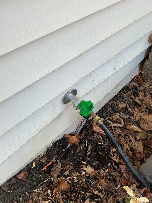 Replaced exterior hose bib with frost-free sillcock featuring brass valve body and chrome mounting flange. Installed new water supply line through wall cavity, securing copper piping to wooden framing members with appropriate mounting hardware and ensuring proper pitch for drainage to prevent freeze damage. Replaced exterior hose bib with frost-free sillcock featuring brass valve body and chrome mounting flange. Installed new water supply line through wall cavity, securing copper piping to wooden framing members with appropriate mounting hardware and ensuring proper pitch for drainage to prevent freeze damage.
