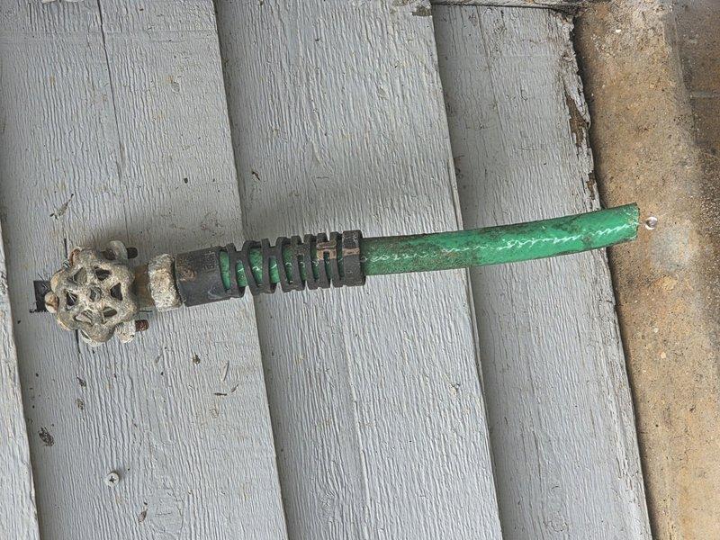 Responded to outdoor plumbing repair request for two leaking water spigots, one with a hose connection seized in place. Removed and replaced deteriorated exterior hose bib with corroded valve assembly and installed new brass fixture with pressure gauge. Addressed stuck hose connection and resolved both leak issues to restore proper function of outdoor water supply system. Responded to outdoor plumbing repair request for two leaking water spigots, one with a hose connection seized in place. Removed and replaced deteriorated exterior hose bib with corroded valve assembly and installed new brass fixture with pressure gauge. Addressed stuck hose connection and resolved both leak issues to restore proper function of outdoor water supply system.