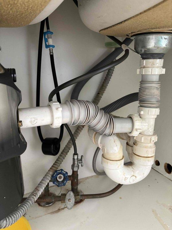Replaced defective garbage disposal unit with new InSinkErator model. Evaluated existing drain configuration and reworked PVC piping under sink to accommodate new disposal unit, ensuring proper alignment and secure connections. Tested system for leaks and verified proper drainage operation. Replaced defective garbage disposal unit with new InSinkErator model. Evaluated existing drain configuration and reworked PVC piping under sink to accommodate new disposal unit, ensuring proper alignment and secure connections. Tested system for leaks and verified proper drainage operation.